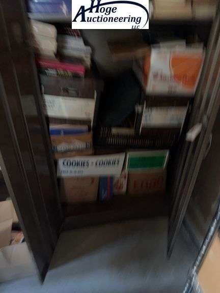 Cookbooks and tin cabinet ￼