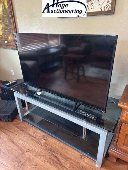 Sony flatscreen TV and TV stand. Remote included