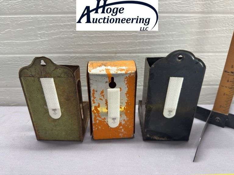 3 tin hanging matchboxes. 1 McCabe - Carruth Funeral Home, 1 R Grocer Delhi Iowa, 1 non-advertising 