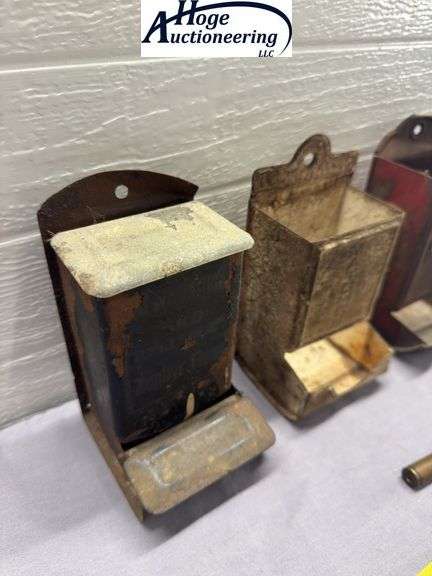 4 tin hanging matchboxes and homemade tool. 1 Zephyr Flour, 1 Fred Karle Furniture and Undertaking K