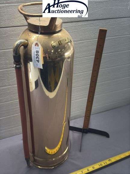 Copper fire extinguisher. General Model Quick AId Fire Guard. The General Detroit Corp.