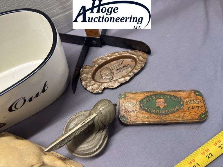 1 flat. Pontiac ashtray, Indian head cap, Keen Kutter Razor tin, Camel Cigarettes tin, Fat is Beauti