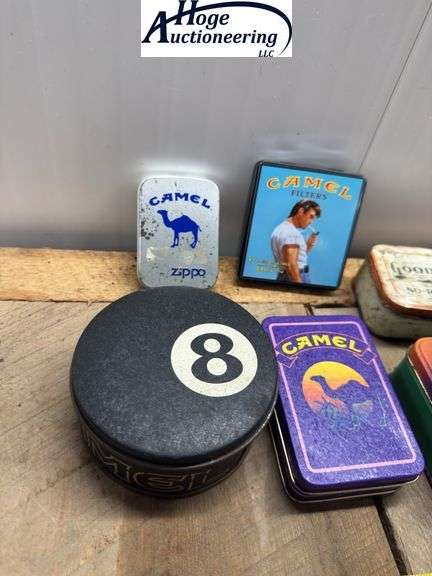 6 tin boxes. 4 Camel tins, 1 Camel Zippo tin, 1 Good Year tin,