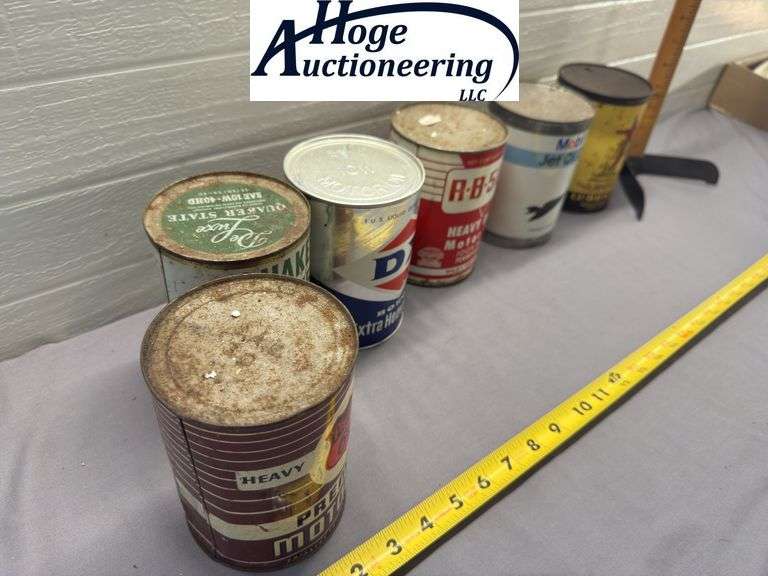 6 one quart cans. 1 Quaker State, 1 Mobil, 1 DX, 1 Archer, 1 RB 500, 1 Phillips 66