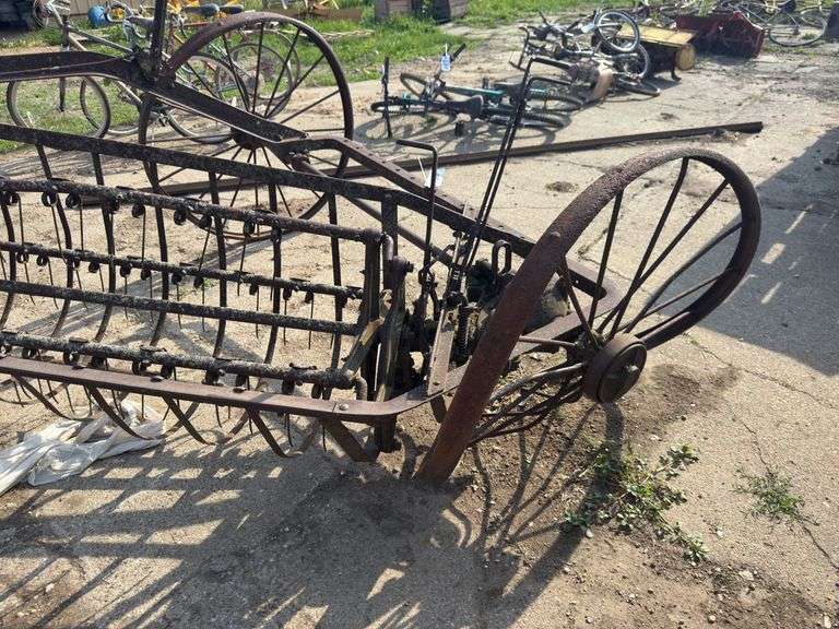 Antique yard art steel hay rake
