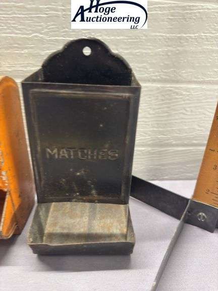 3 tin hanging matchboxes. 1 McCabe - Carruth Funeral Home, 1 R Grocer Delhi Iowa, 1 non-advertising 