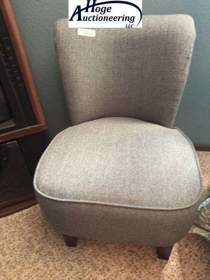 Grey cloth curved back chair
