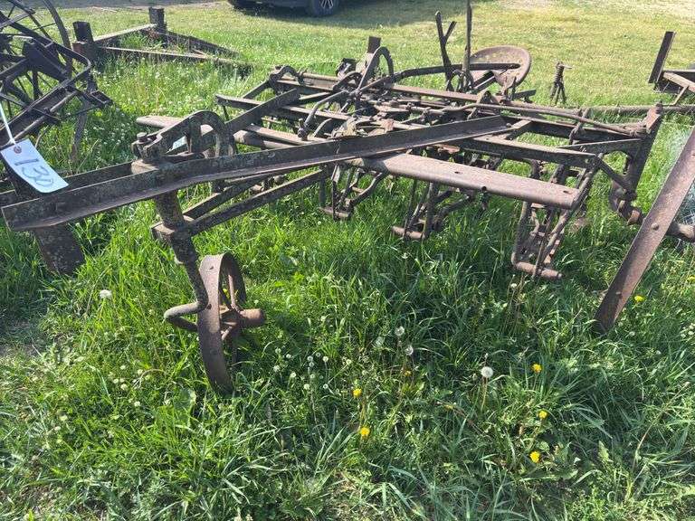 Antique JD corn plow