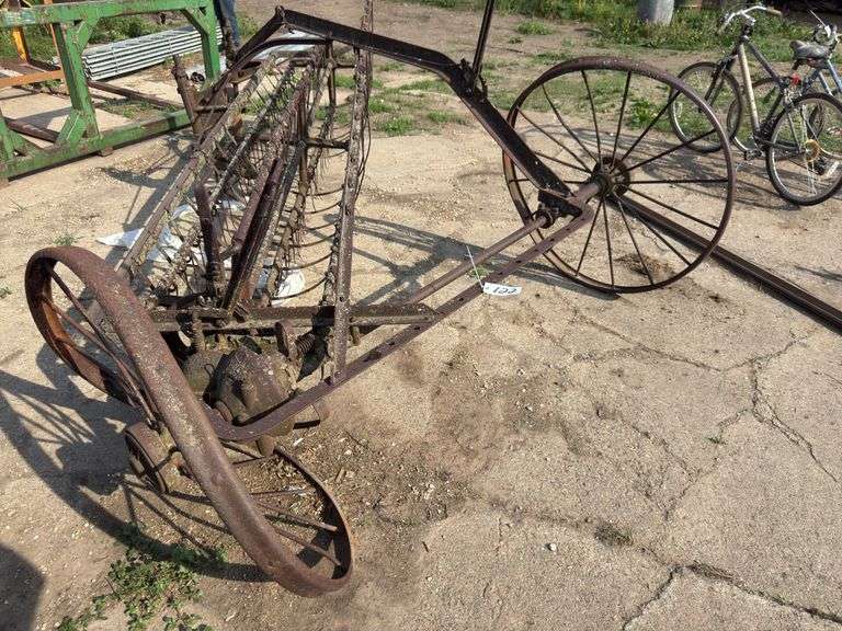 Antique yard art steel hay rake