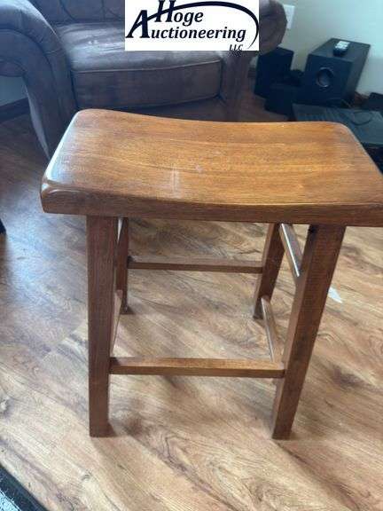 Wooden saddle bar stool
