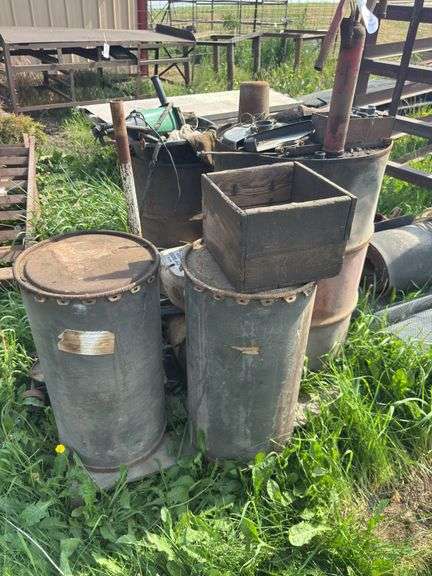 Pallet with miscellaneous barrels, floor jack, iron