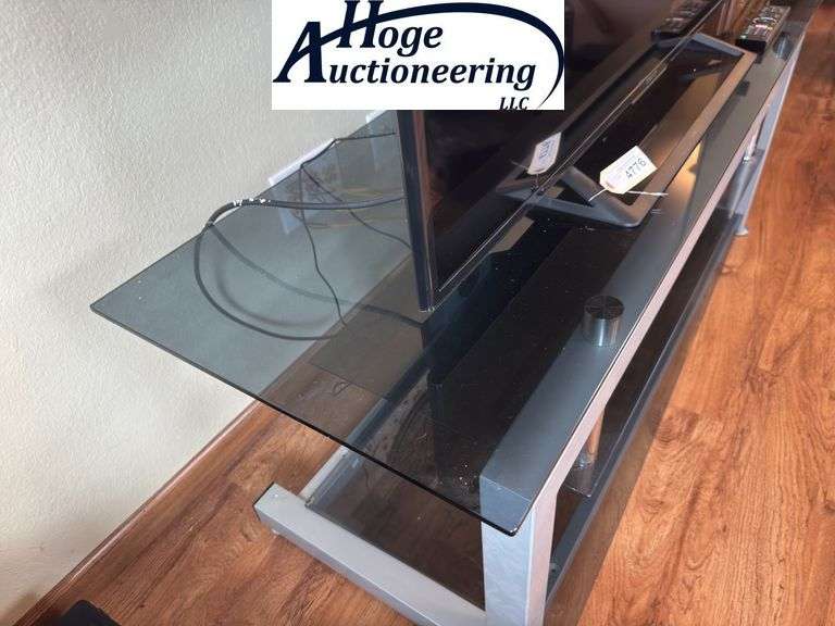 Sony flatscreen TV and TV stand. Remote included