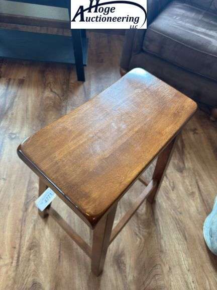Wooden saddle bar stool