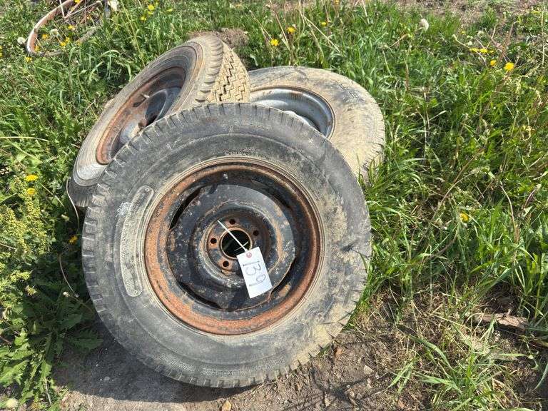 3 tires w/rims. 2-7.00-15LT, 1- LT235/85R16