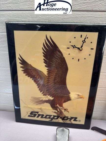 3 items. 1 Snap-on John E. Bradley eagle clock, 1 Pendleton Whisky sign, 1 Capital Brewery sign.