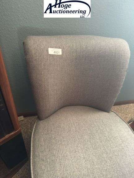 Grey cloth curved back chair