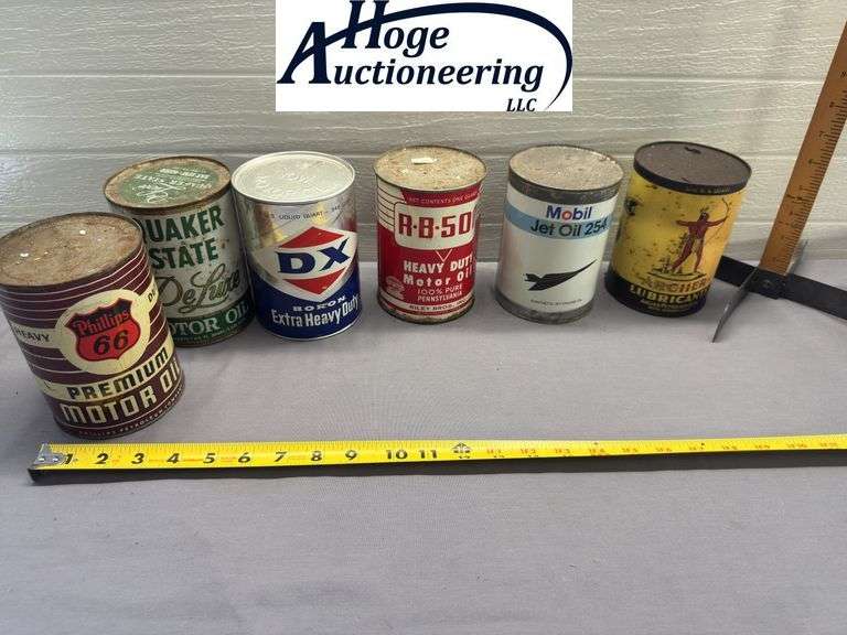 6 one quart cans. 1 Quaker State, 1 Mobil, 1 DX, 1 Archer, 1 RB 500, 1 Phillips 66
