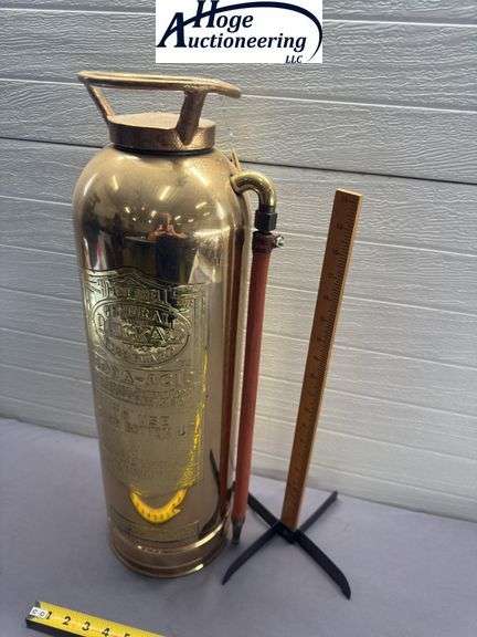 Copper fire extinguisher. General Model Quick AId Fire Guard. The General Detroit Corp.