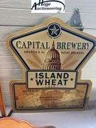 3 items. 1 Snap-on John E. Bradley eagle clock, 1 Pendleton Whisky sign, 1 Capital Brewery sign.