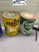 6 one quart oil cans. 3 Quaker State, 2 Pennzoil, 1 Sunoco
