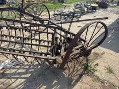 Antique yard art steel hay rake
