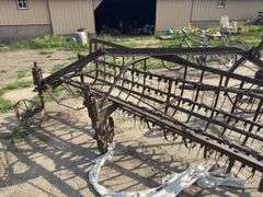 Antique yard art steel hay rake