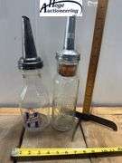 2 one quart glass oil bottles.1 embossed Standard Oil Company Service (Indiana), 1 Huffman Mfg Compa