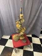 Brass props on roller display