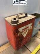 2 cans. Conoco Mineral Oil can (2 gallons), Phillips 66 Anti-Freeze can (1 gallon)