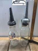 2 one quart glass oil bottles.1 embossed Standard Oil Company Service (Indiana), 1 Huffman Mfg Compa