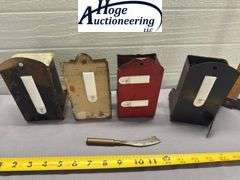 4 tin hanging matchboxes and homemade tool. 1 Zephyr Flour, 1 Fred Karle Furniture and Undertaking K