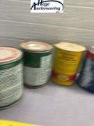 6 one quart oil cans. 3 Quaker State, 2 Pennzoil, 1 Sunoco