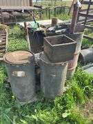 Pallet with miscellaneous barrels, floor jack, iron
