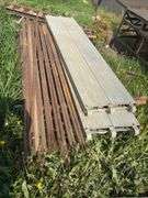 Pallet with scaffolding. 5ft wide, 4ft tall. 7 uprights, 2 planks