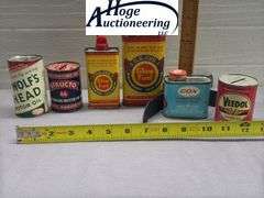 6 cans. Glow fuel and oil. 1 Veedol bank, 1 Structo bank, 1 Wolf's head bank, 1 Cox, 2 O.K. Cub