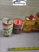 6 cans. Glow fuel and oil. 1 Veedol bank, 1 Structo bank, 1 Wolf's head bank, 1 Cox, 2 O.K. Cub
