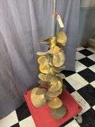 Brass props on roller display
