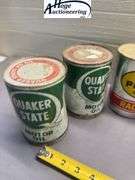 6 one quart oil cans. 3 Quaker State, 2 Pennzoil, 1 Sunoco