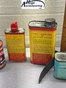 6 cans. Glow fuel and oil. 1 Veedol bank, 1 Structo bank, 1 Wolf's head bank, 1 Cox, 2 O.K. Cub