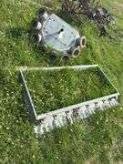 Bin door frame and 6" distributor