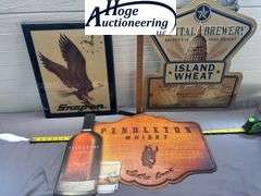 3 items. 1 Snap-on John E. Bradley eagle clock, 1 Pendleton Whisky sign, 1 Capital Brewery sign.