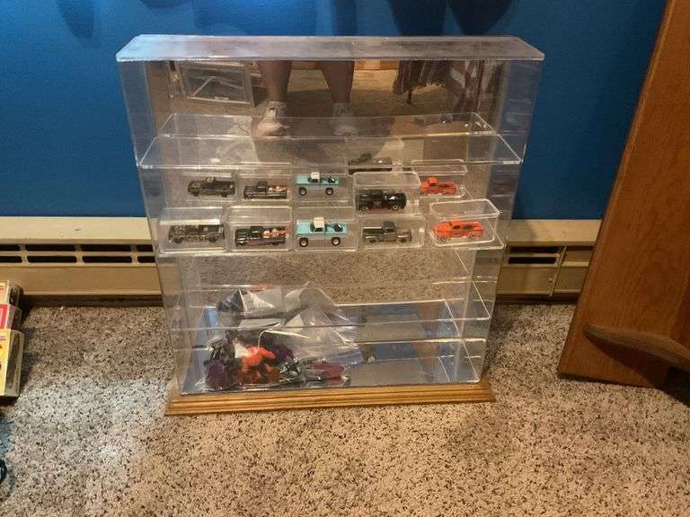 Display case and cars