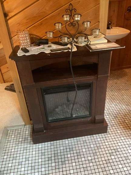Electric fireplace and contents