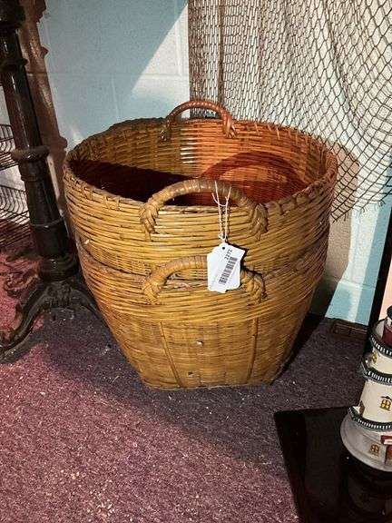 Two woven baskets w/ handles