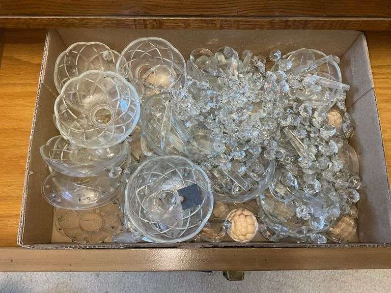 Contents of drawer: glass bobesche and prisms