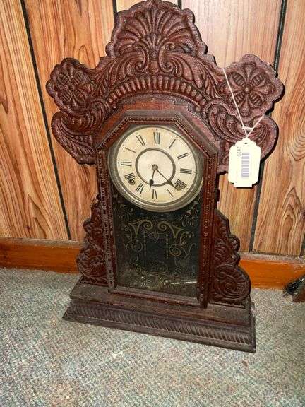 Oak press carved shelf clock