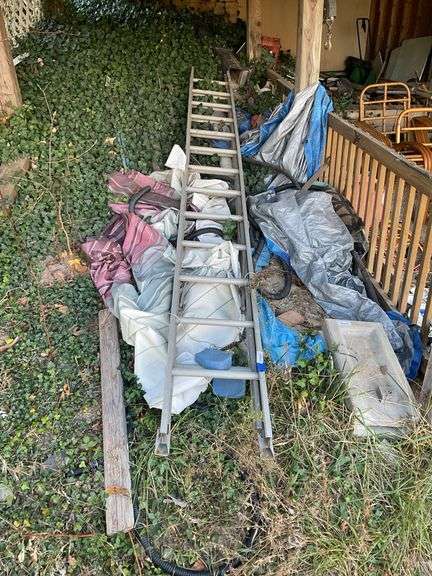 Aluminum extension ladder, tarps - Hurley Real Estate & Auctions