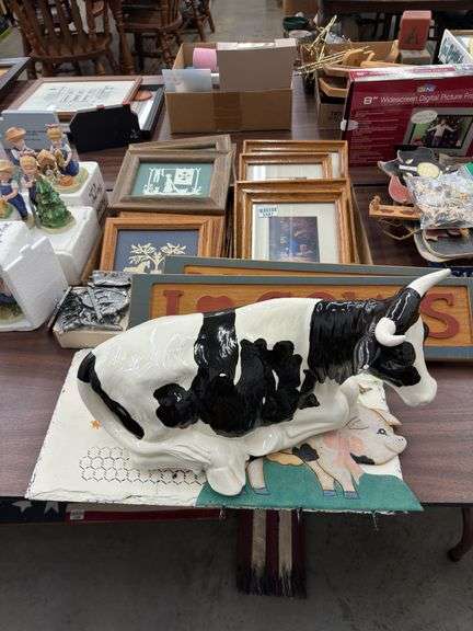 Farm decor lot to include milk signs, cow w/ chip in ear, artwork, children on the farm