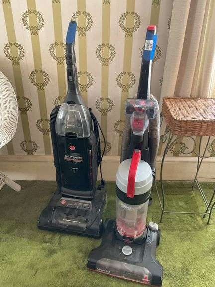 Two upright vacuums: Bissell PowerForce and Hoover self-propelled Wind Tunnel
