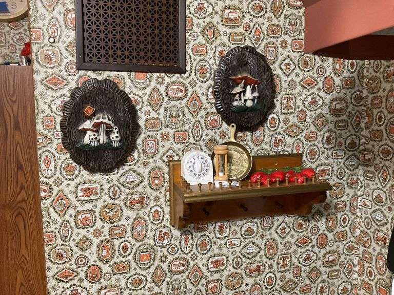 Two mushroom wall plaques, bracket wall shelf and contents